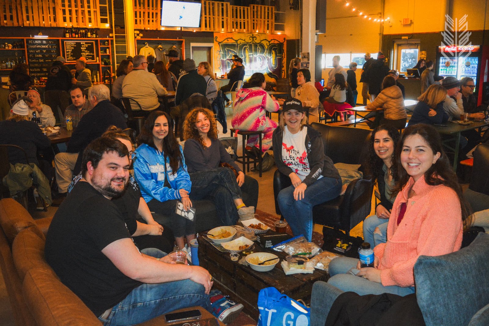 Friends gathering in the taproom lounge.