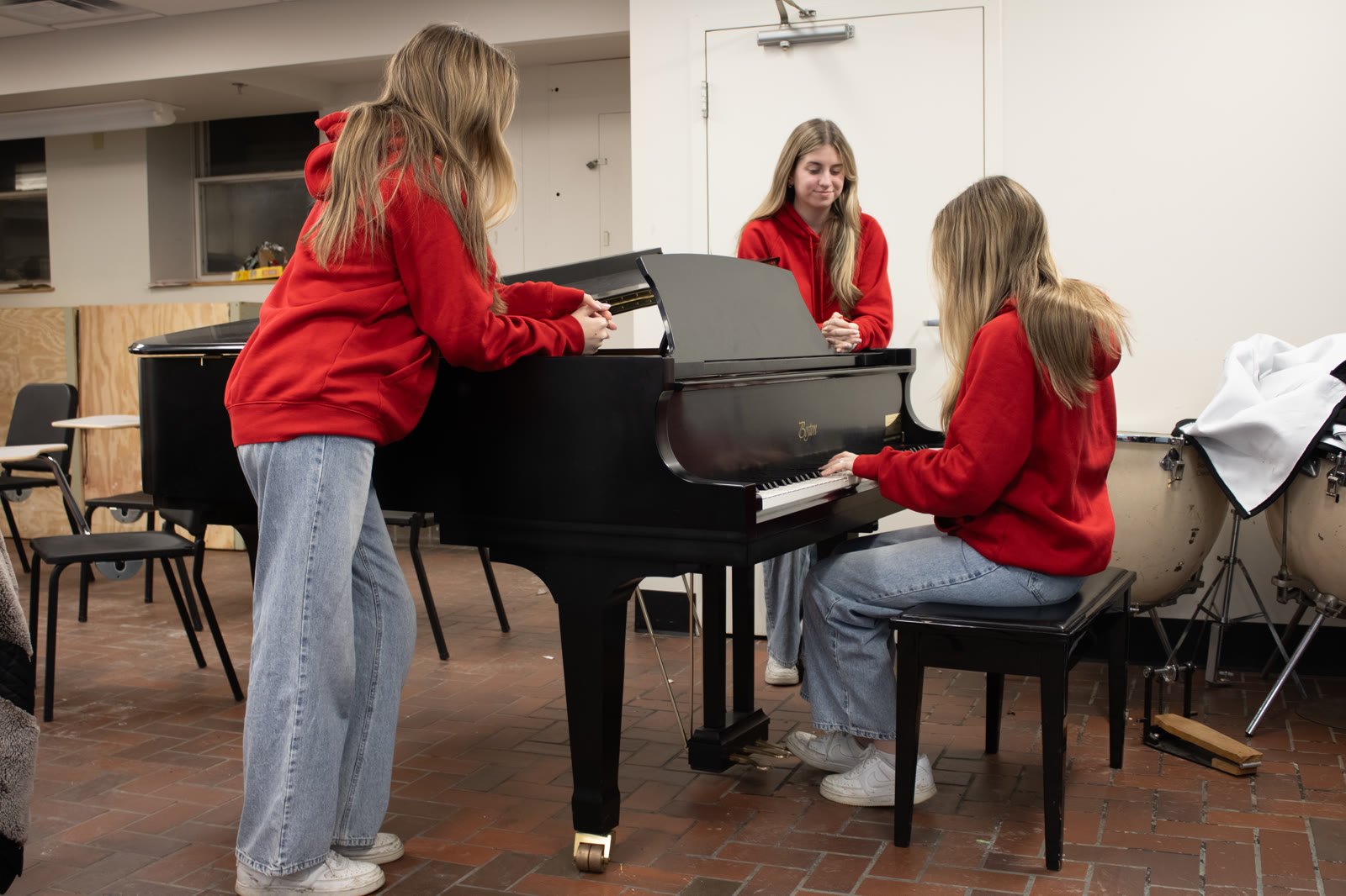 From "Piano Reflections," a portrait study shot around a grand piano.